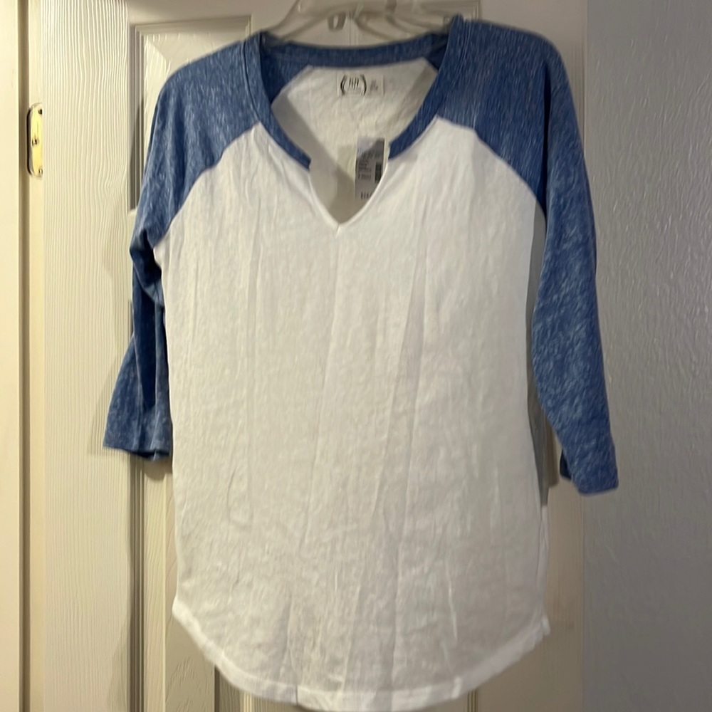 Maurices XS shirt never worn with tag. White with blue sleeves.